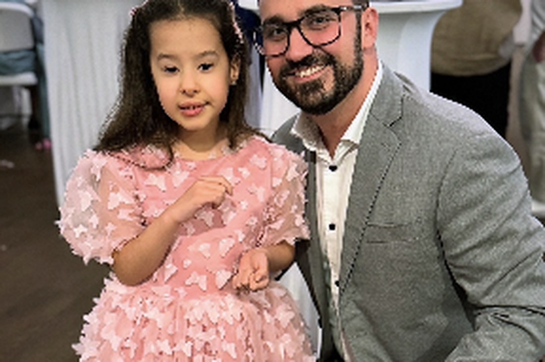 Christopher Papallo with a young guest at a TPFF fundraiser